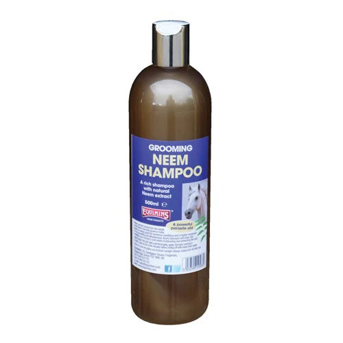 Bottle of Neem shampoo for grooming on a white background