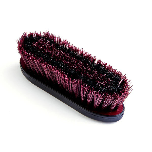 Bristle side of 'Ezi-Groom' dandy brush on a white background