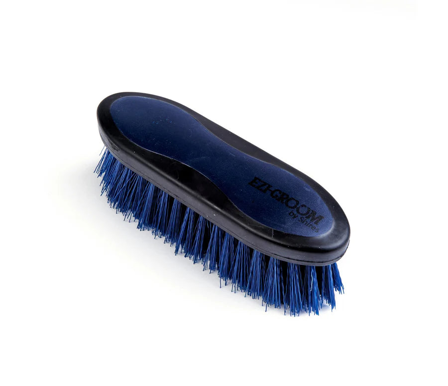 Navy grooming brush with 'Ezi-Groom' branding on a white background