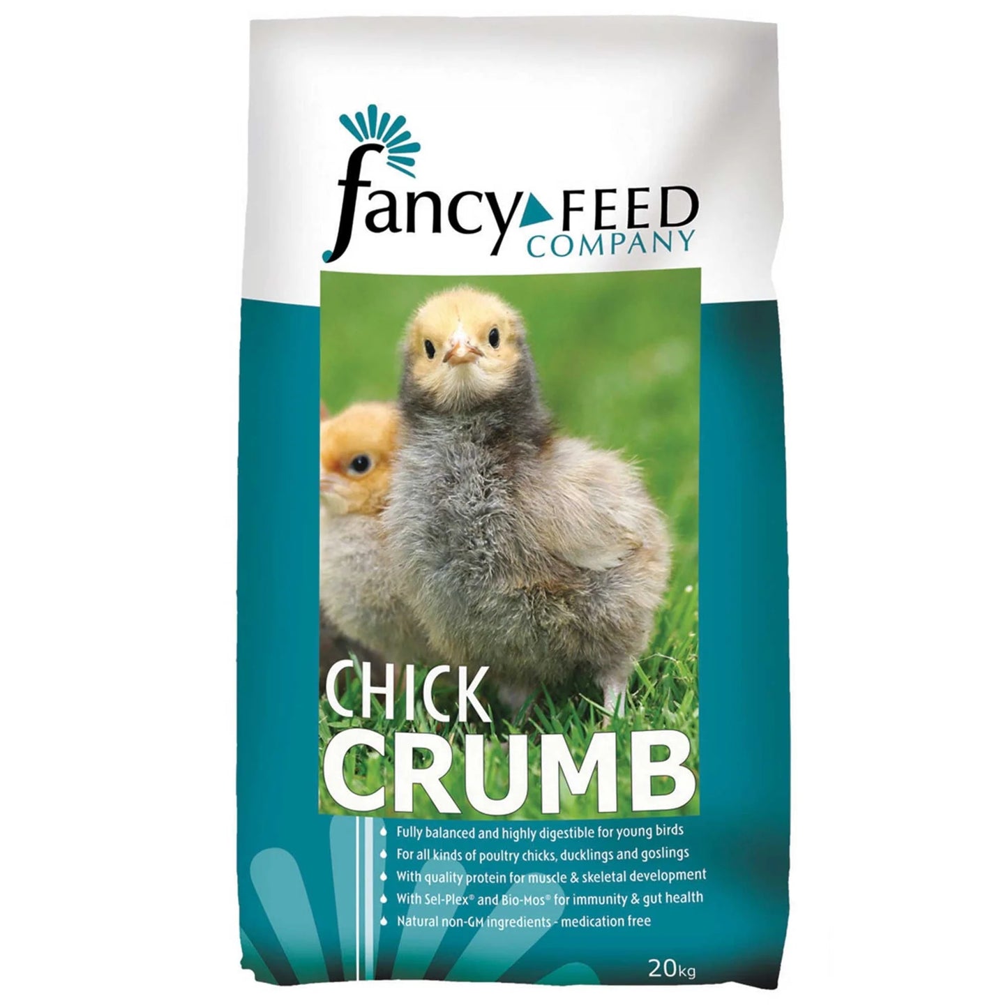 Bag of Fancy Feed Company Chick Crumb with chicks on a grassy background