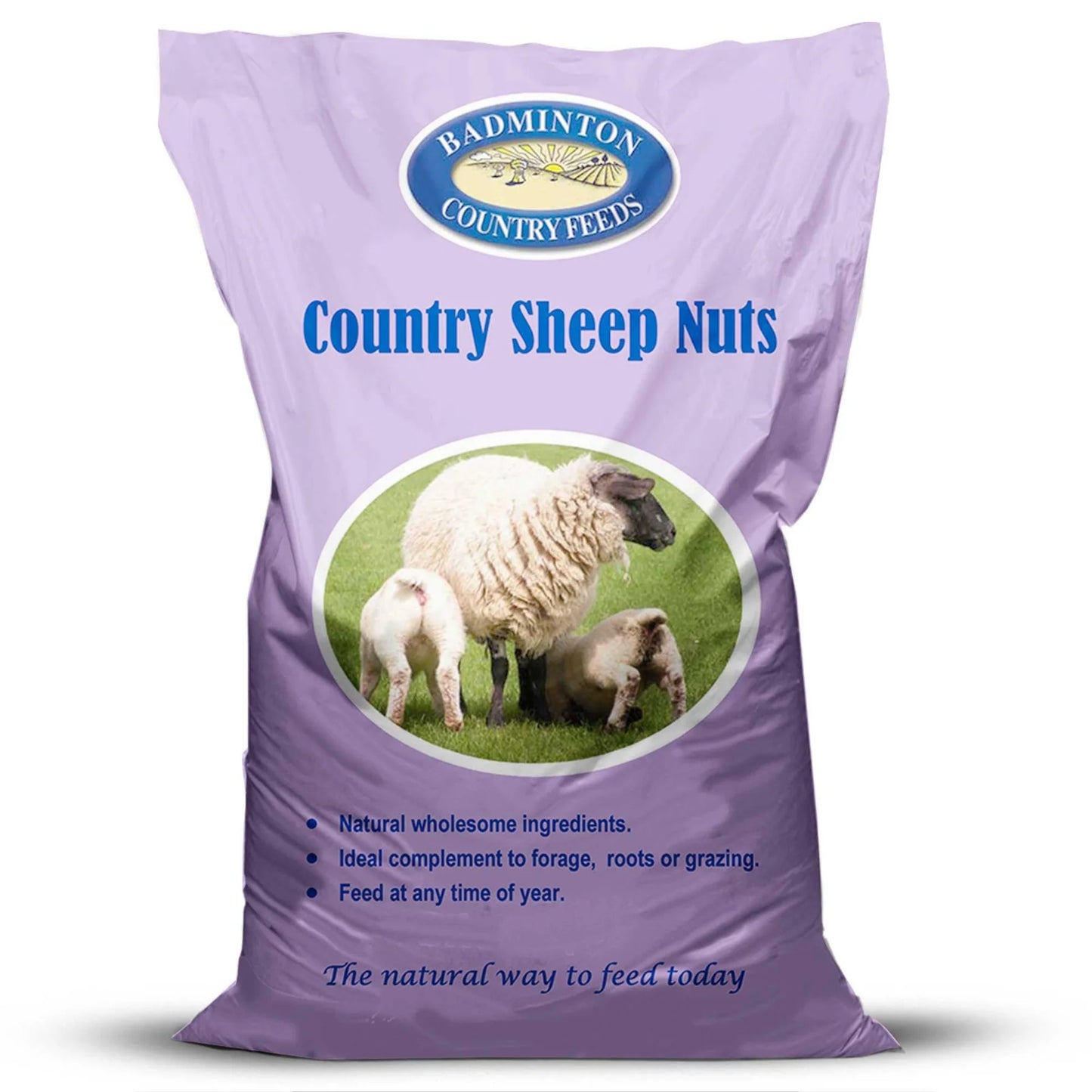 A purple bag of Badminton Country Feels Country Sheep Nuts feed supplement, featuring a circular logo and an image of sheep on a green field.