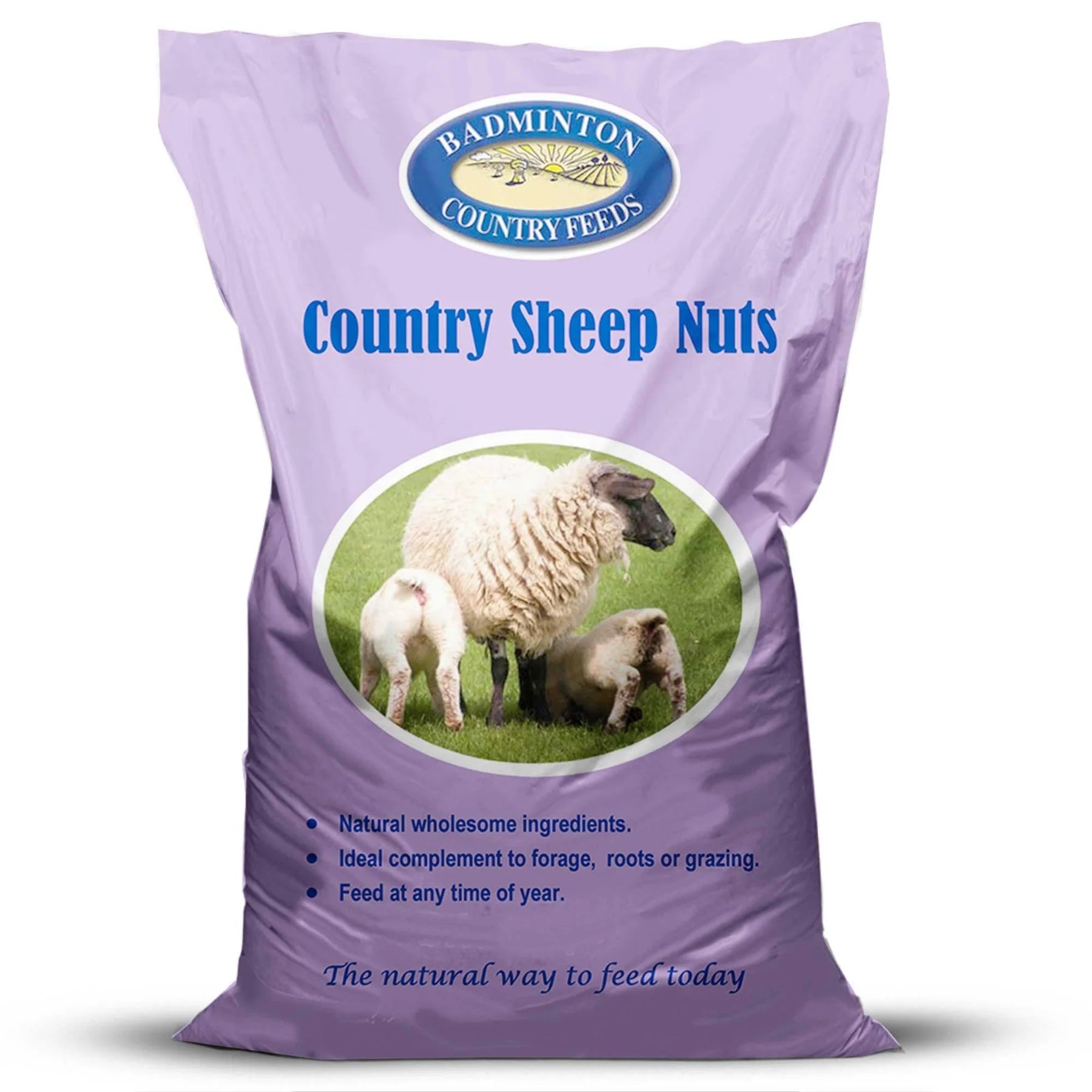 A purple bag of Badminton Country Feels Country Sheep Nuts feed supplement, featuring a circular logo and an image of sheep on a green field.