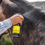 Flygard being applied to horse