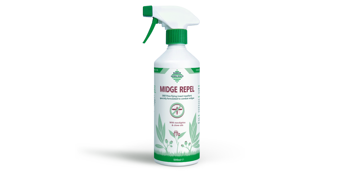 Midge repellent spray bottle on a white background