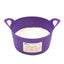 Purple salt lick tub filled with salt on a white background