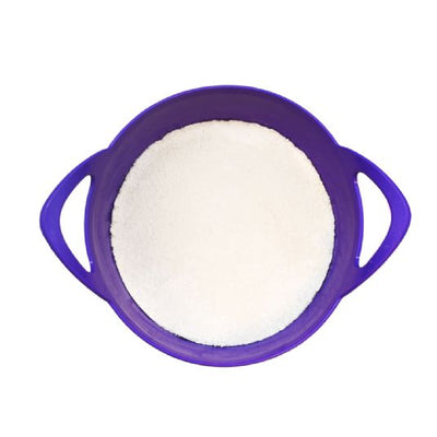 Purple tub with white salt inside on a white background