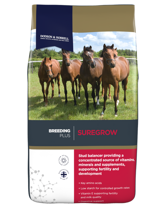 A bag of Dodson & Horrell Suregrow  stud balancer horse feed, featuring a photo of four brown horses in a green field on the front packaging.