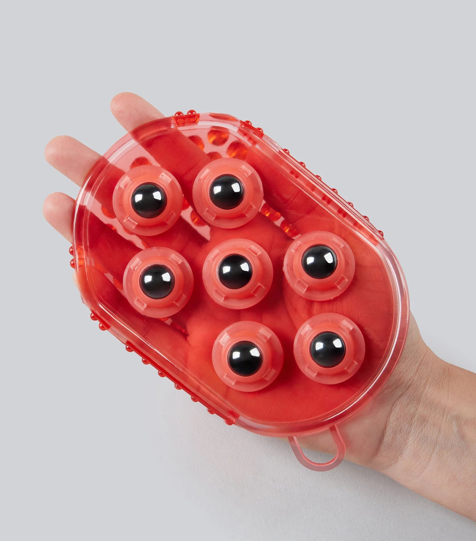 Premier Equine Magnetic Horse Massage Mitt being held in hand