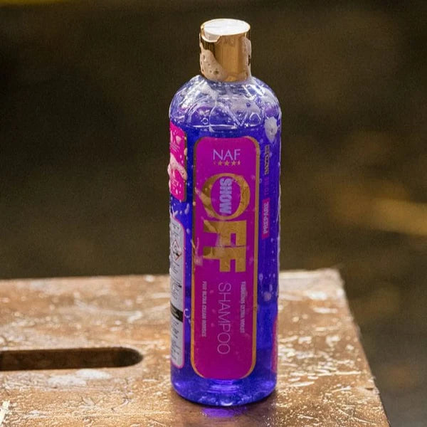 soapy bottle of NAF Show Off Shampoo 500ml deep cleansing horse shampoo