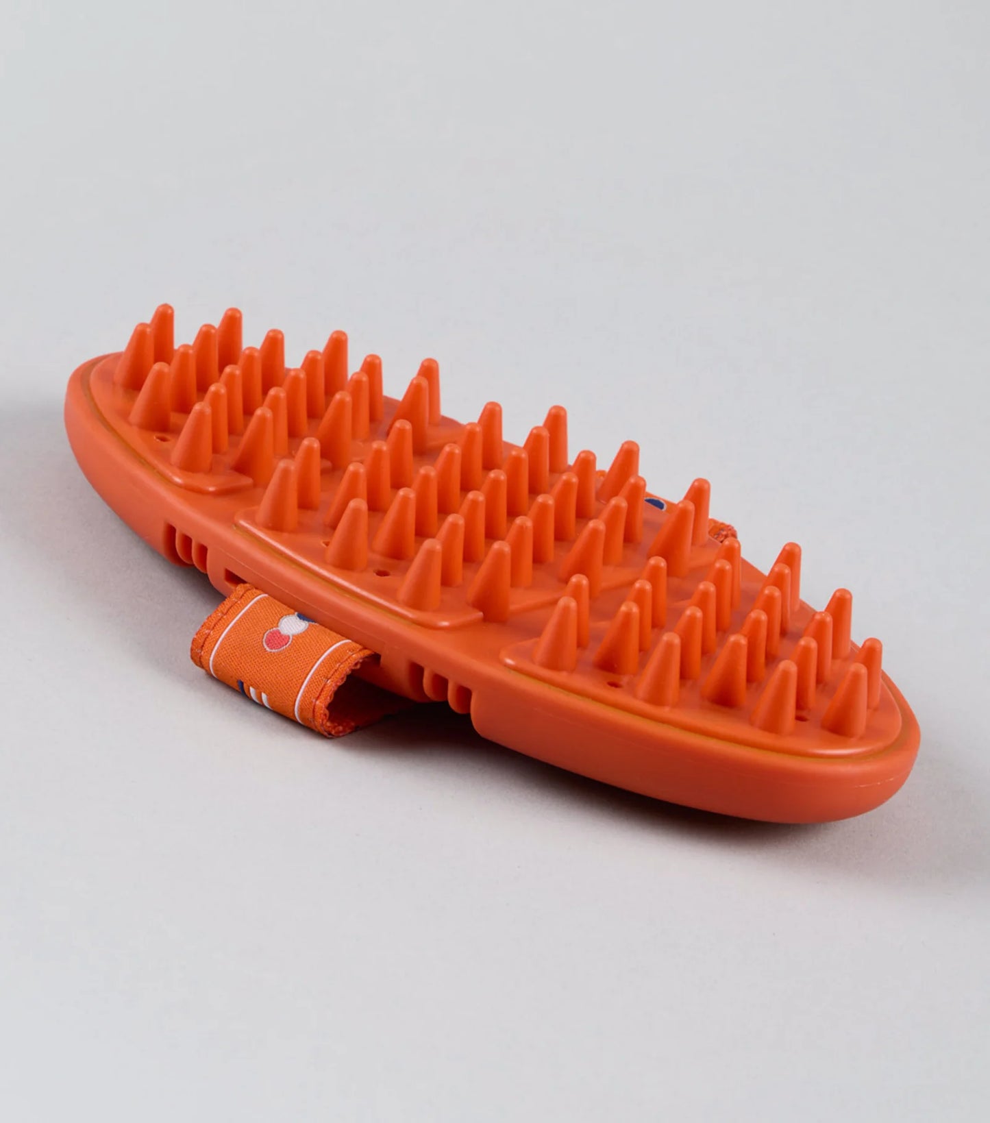 Premier Equine Soft-Touch Flexi Massage Brush orange