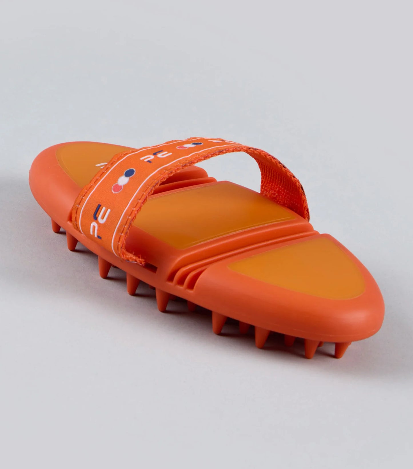Premier Equine Soft-Touch Flexi Massage Brush orange