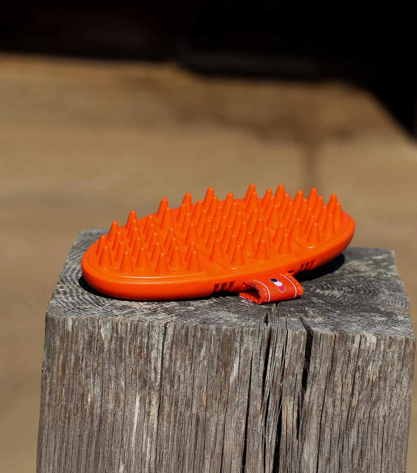 Premier Equine Soft-Touch Flexi Massage Brush orange
